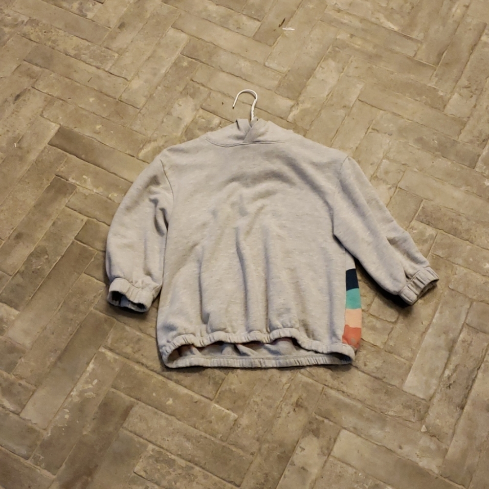 Girls sweatshirt with colorful stripes on the back